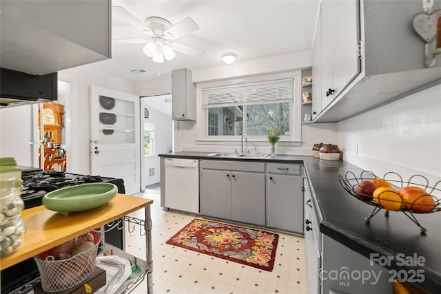 261 Forest Hill Dr, Asheville, NC 28803 - kitchen featuring dishwasher, dark countertops, light floors, and ceiling fan