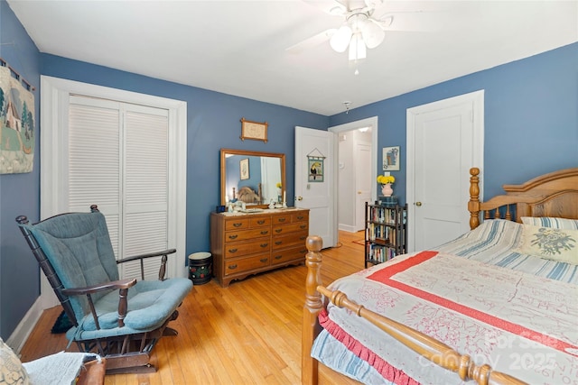 261 Forest Hill Dr, Asheville, NC 28803 - bedroom featuring a closet, light wood-style floors, and ceiling fan