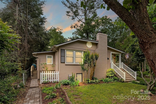 261 Forest Hill Dr, Asheville, NC 28803 - view of front of home featuring a chimney and stucco siding