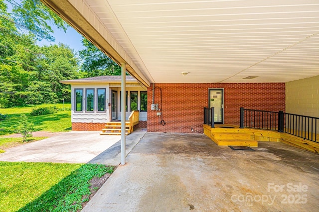 4783 Calico Rd, Lenoir, NC 28645 - view of patio / terrace featuring an attached carport