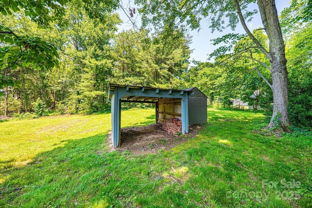 4783 Calico Rd, Lenoir, NC 28645 - view of green lawn featuring an outdoor structure