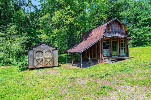 4783 Calico Rd, Lenoir, NC 28645 - view of shed with a wooded view