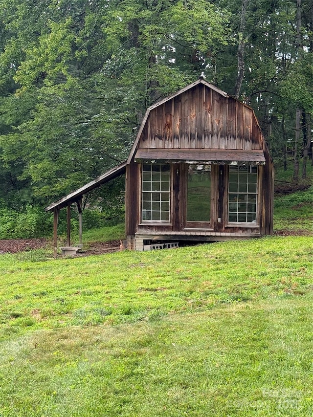 4783 Calico Rd, Lenoir, NC 28645 - view of outbuilding featuring a wooded view