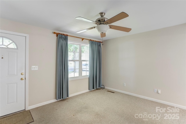 2105 Florida Ave, Kannapolis, NC 28083 - foyer entrance featuring carpet flooring, baseboards, and ceiling fan
