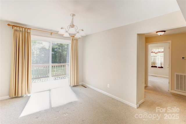 2105 Florida Ave, Kannapolis, NC 28083 - carpeted spare room with a chandelier and baseboards