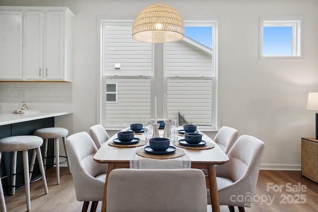 16112 Langston Dr, Charlotte, NC 28278 - dining space with light wood-style floors and healthy amount of natural light