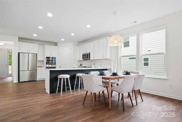 16112 Langston Dr, Charlotte, NC 28278 - dining area featuring dark wood-style flooring and recessed lighting