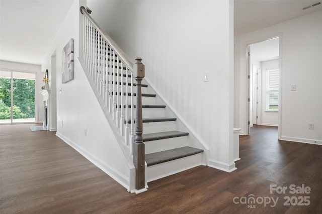 16112 Langston Dr, Charlotte, NC 28278 - stairway with wood finished floors and baseboards