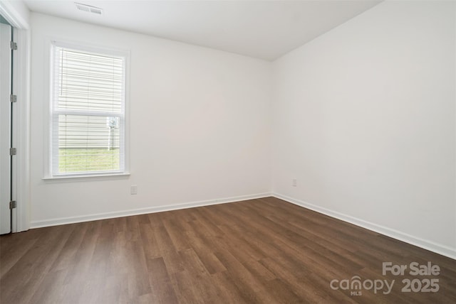 16112 Langston Dr, Charlotte, NC 28278 - unfurnished room featuring dark wood-type flooring and baseboards