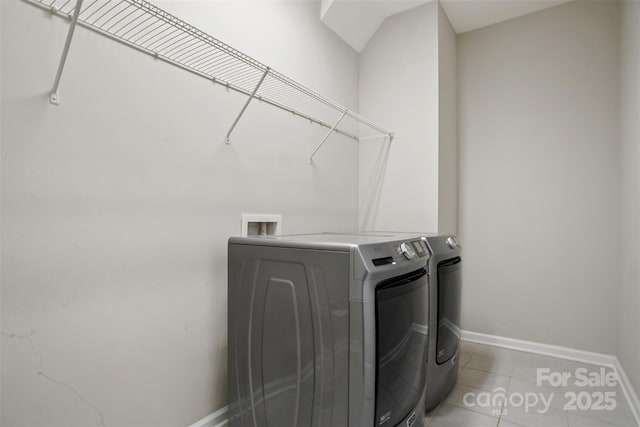 16112 Langston Dr, Charlotte, NC 28278 - washroom featuring washer and clothes dryer and tile patterned flooring