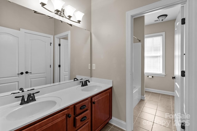 126 Northbridge Dr, Mooresville, NC 28115 - bathroom with double vanity, tile patterned floors, shower / washtub combination, and baseboards