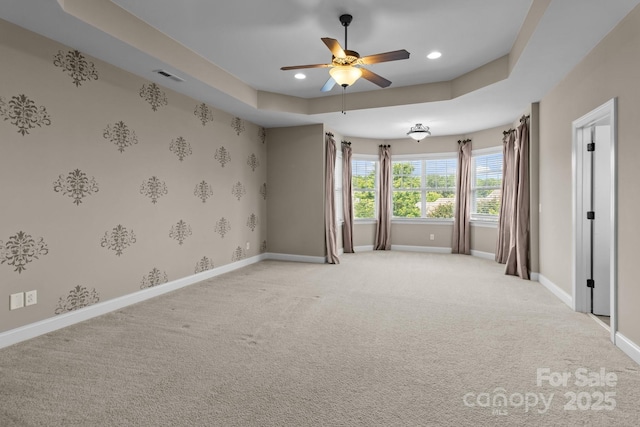 126 Northbridge Dr, Mooresville, NC 28115 - unfurnished room with ceiling fan, light colored carpet, baseboards, recessed lighting, and a tray ceiling