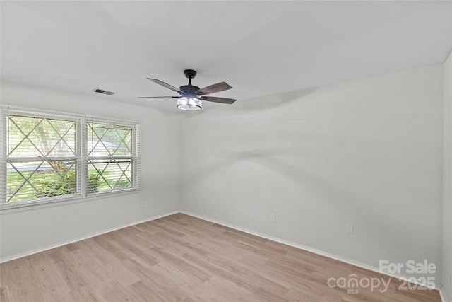 5329 Valley Forge Rd, Charlotte, NC 28210 - empty room featuring light wood-style floors and a ceiling fan