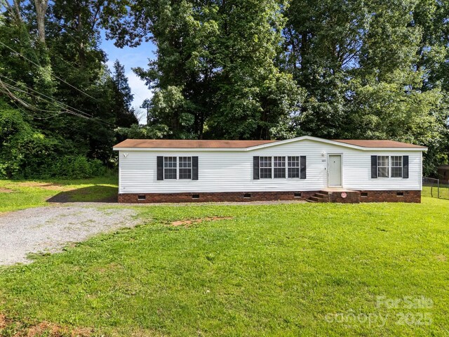 1011 Rachel Ln, Salisbury, NC 28147 - manufactured / mobile home featuring crawl space, entry steps, and a front lawn