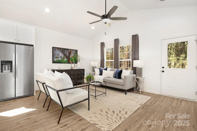 4230 Acorn St, Charlotte, NC 28205 - living room featuring high vaulted ceiling, light wood-style floors, a ceiling fan, and recessed lighting
