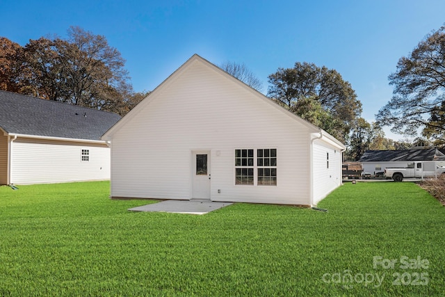 4230 Acorn St, Charlotte, NC 28205 - rear view of house with a lawn and a patio area