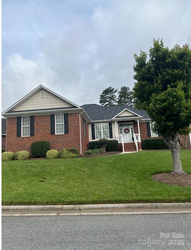 2300 Wednesbury Ct, Kannapolis, NC 28083 - ranch-style house featuring brick siding and a front yard