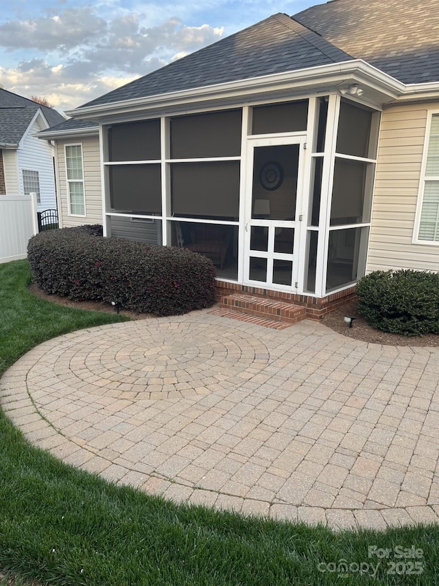 2300 Wednesbury Ct, Kannapolis, NC 28083 - back of house with a sunroom, a patio area, and roof with shingles