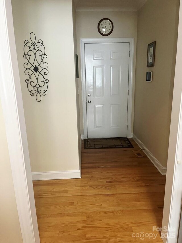 2300 Wednesbury Ct, Kannapolis, NC 28083 - doorway to outside featuring light wood finished floors and baseboards