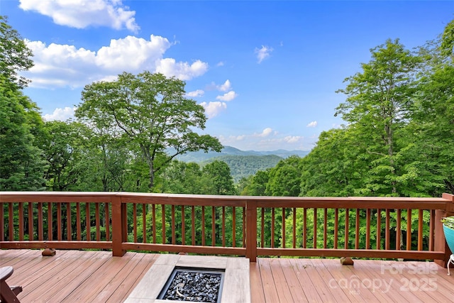 853 Granny Lewis Ln, Mars Hill, NC 28754 - wooden deck with a mountain view