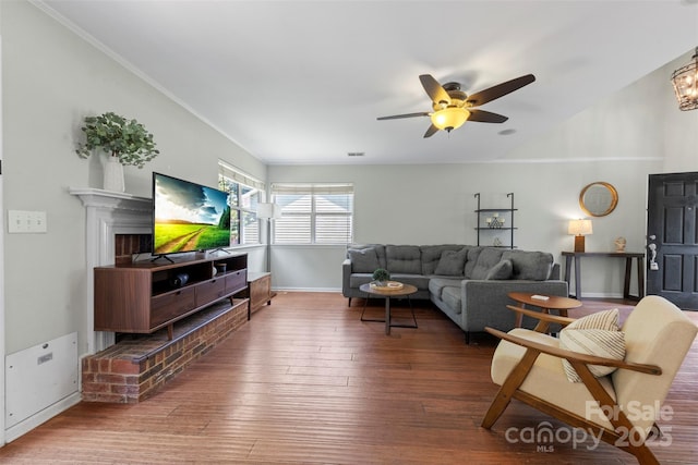 7425 Hubbard Woods Rd, Charlotte, NC 28269 - living area featuring wood finished floors and ceiling fan