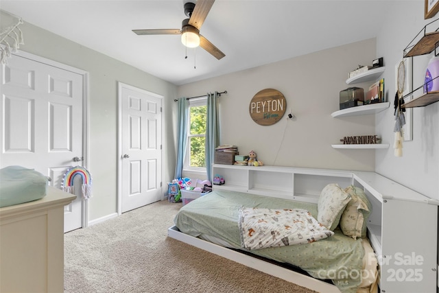 7425 Hubbard Woods Rd, Charlotte, NC 28269 - bedroom with carpet flooring and a ceiling fan