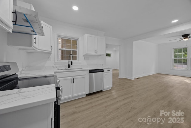 442 Lovelace Rd, Rock Hill, SC 29730 - kitchen with stainless steel appliances, exhaust hood, white cabinetry, ceiling fan, and light stone countertops