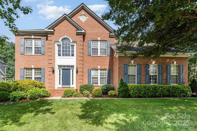 1002 Hollyhedge Ln, Indian Trail, NC 28079 - view of front of property with brick siding and a front lawn