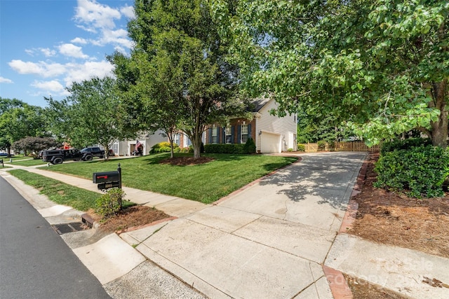 1002 Hollyhedge Ln, Indian Trail, NC 28079 - view of property hidden behind natural elements with concrete driveway