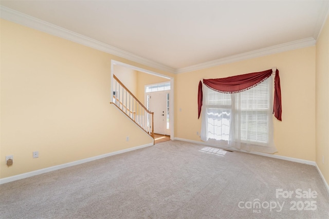 1002 Hollyhedge Ln, Indian Trail, NC 28079 - spare room featuring crown molding, stairs, and carpet