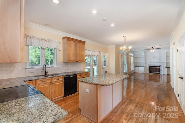 1002 Hollyhedge Ln, Indian Trail, NC 28079 - kitchen with dishwasher, a center island, ornamental molding, light stone counters, and open floor plan