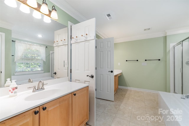 1002 Hollyhedge Ln, Indian Trail, NC 28079 - bathroom with ornamental molding, vanity, a stall shower, a tub, and tile patterned floors