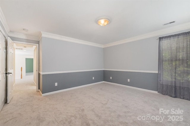 1002 Hollyhedge Ln, Indian Trail, NC 28079 - spare room featuring ornamental molding and carpet flooring