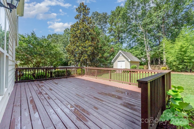 1002 Hollyhedge Ln, Indian Trail, NC 28079 - deck with an outdoor structure and view of wooded area