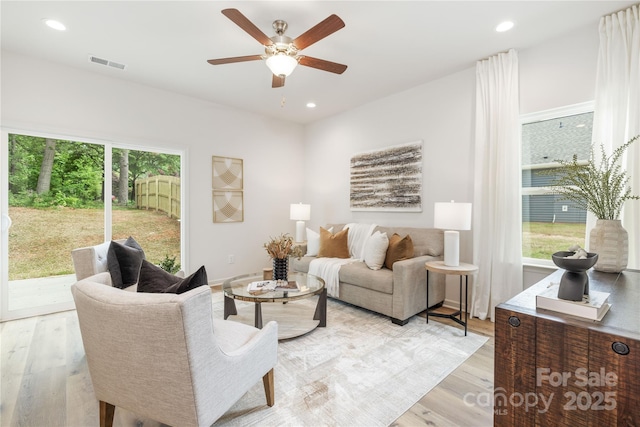 4226 Acorn St, Charlotte, NC 28205 - living area with a ceiling fan, light wood-style flooring, and recessed lighting
