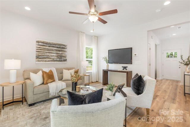 4226 Acorn St, Charlotte, NC 28205 - living area featuring plenty of natural light, recessed lighting, ceiling fan, light wood-style flooring, and baseboards