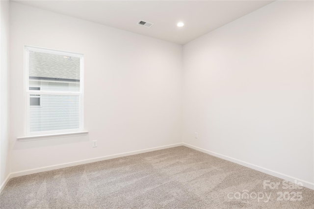 4226 Acorn St, Charlotte, NC 28205 - carpeted empty room with baseboards and recessed lighting