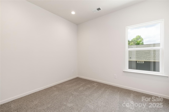 4226 Acorn St, Charlotte, NC 28205 - carpeted empty room featuring baseboards and recessed lighting