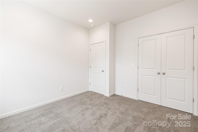 4226 Acorn St, Charlotte, NC 28205 - unfurnished bedroom with carpet flooring, baseboards, recessed lighting, and a closet