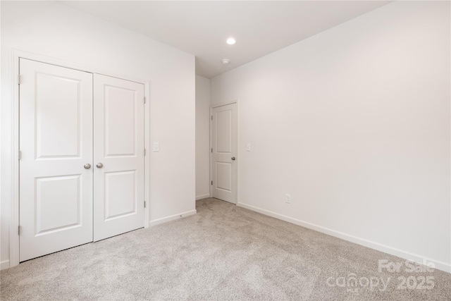4226 Acorn St, Charlotte, NC 28205 - unfurnished bedroom featuring carpet floors, a closet, and recessed lighting