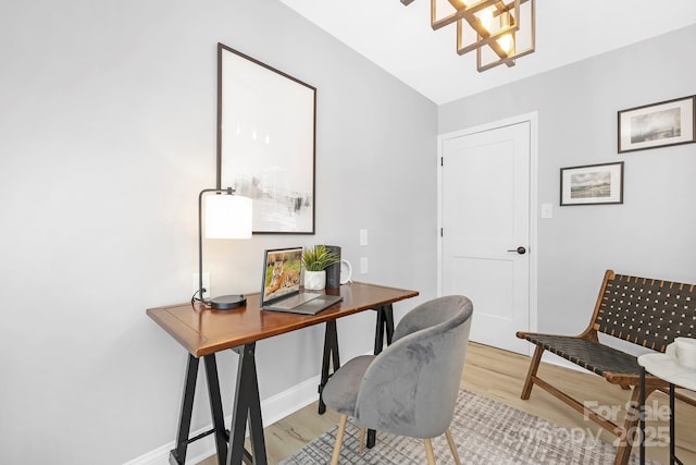 715 White Oaks Cir, Monroe, NC 28110 - office space featuring light wood-style flooring and a chandelier