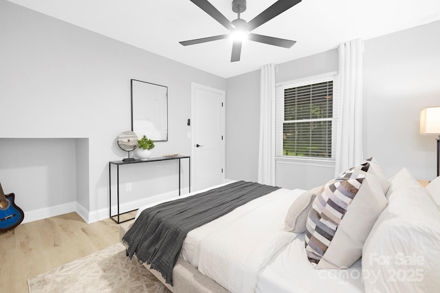 715 White Oaks Cir, Monroe, NC 28110 - bedroom with wood finished floors and ceiling fan