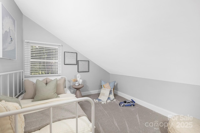715 White Oaks Cir, Monroe, NC 28110 - carpeted bedroom featuring vaulted ceiling and baseboards