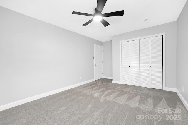 715 White Oaks Cir, Monroe, NC 28110 - unfurnished bedroom with carpet floors, a closet, and ceiling fan