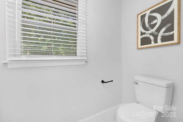 715 White Oaks Cir, Monroe, NC 28110 - half bathroom with baseboards and toilet