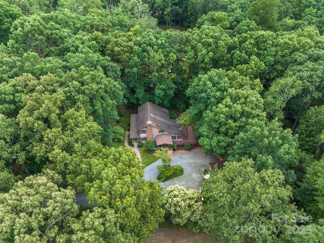 715 White Oaks Cir, Monroe, NC 28110 - aerial view of property and surrounding area featuring a heavily wooded area