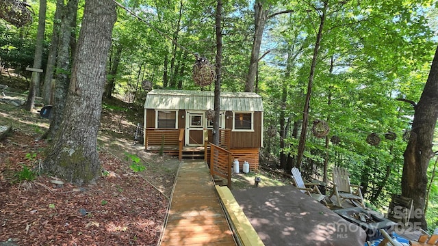 871 Lower Nettle Knob Rd, West Jefferson, NC 28694 - rustic home featuring an outbuilding and a metal roof