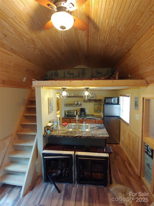 871 Lower Nettle Knob Rd, West Jefferson, NC 28694 - dining area featuring wooden ceiling, stairway, wood finished floors, ceiling fan, and vaulted ceiling