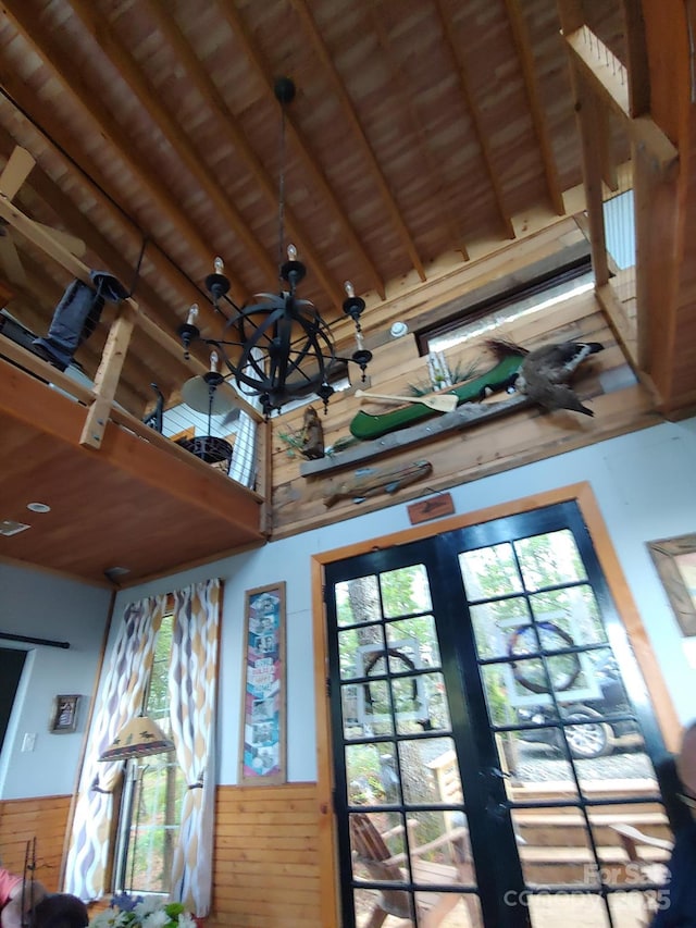 871 Lower Nettle Knob Rd, West Jefferson, NC 28694 - detailed view of a chandelier, a wooden ceiling with exposed beams, and french doors