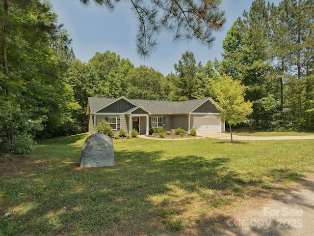 429 Summer Ridge Dr, Stanley, NC 28164 - view of front of property featuring a garage, a front yard, concrete driveway, and board and batten siding